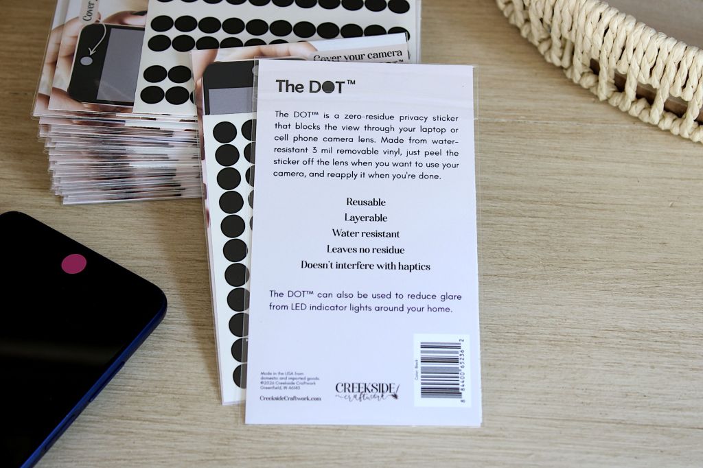 Cover your camera with The DOT™, now available to sell in retail stores. This image shows the back of the retail packaging.